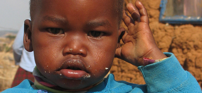 Small toddler staring at the camera